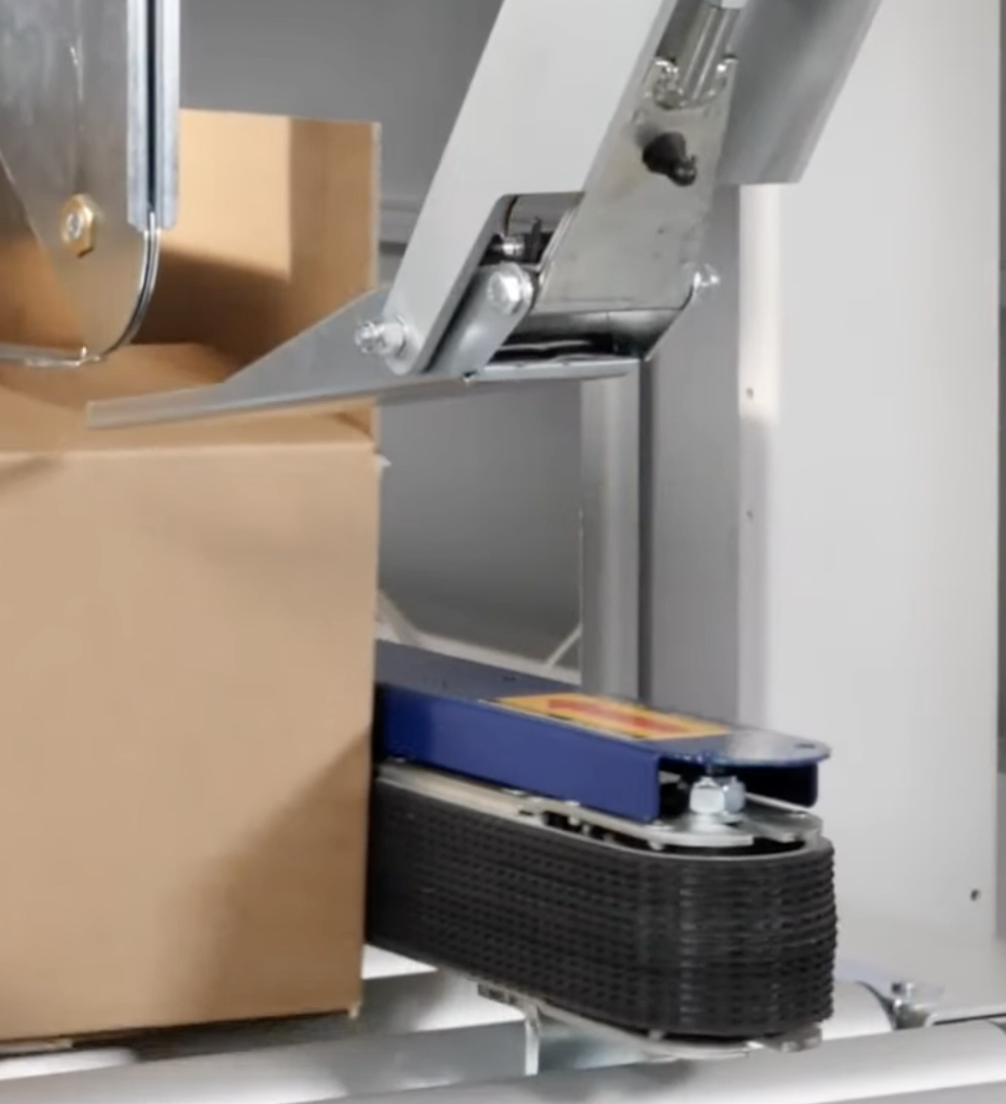 半自动湿水封箱机-牛皮纸湿水打包机-封箱机芯